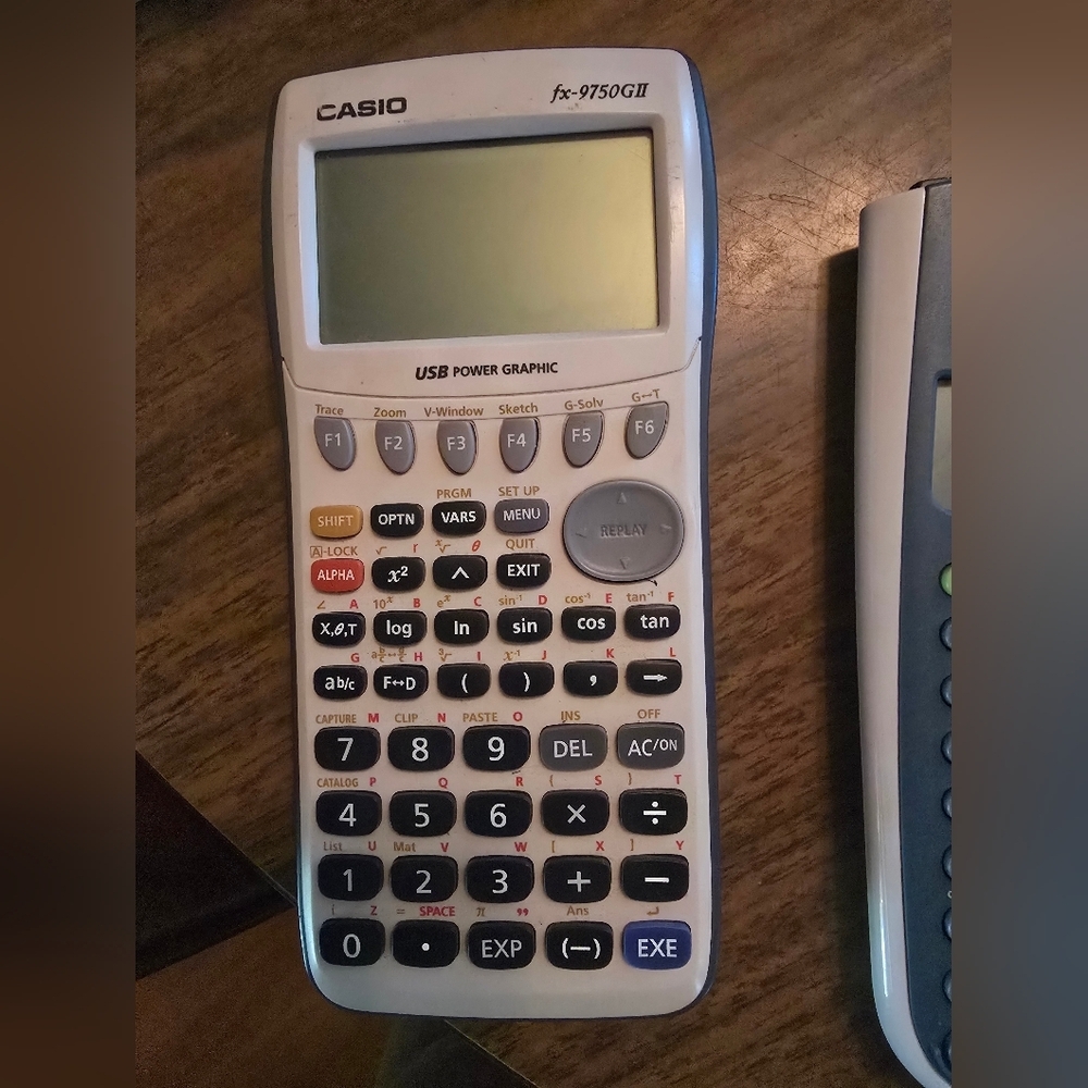 Casio White Graphing Calculator with Black Keypad